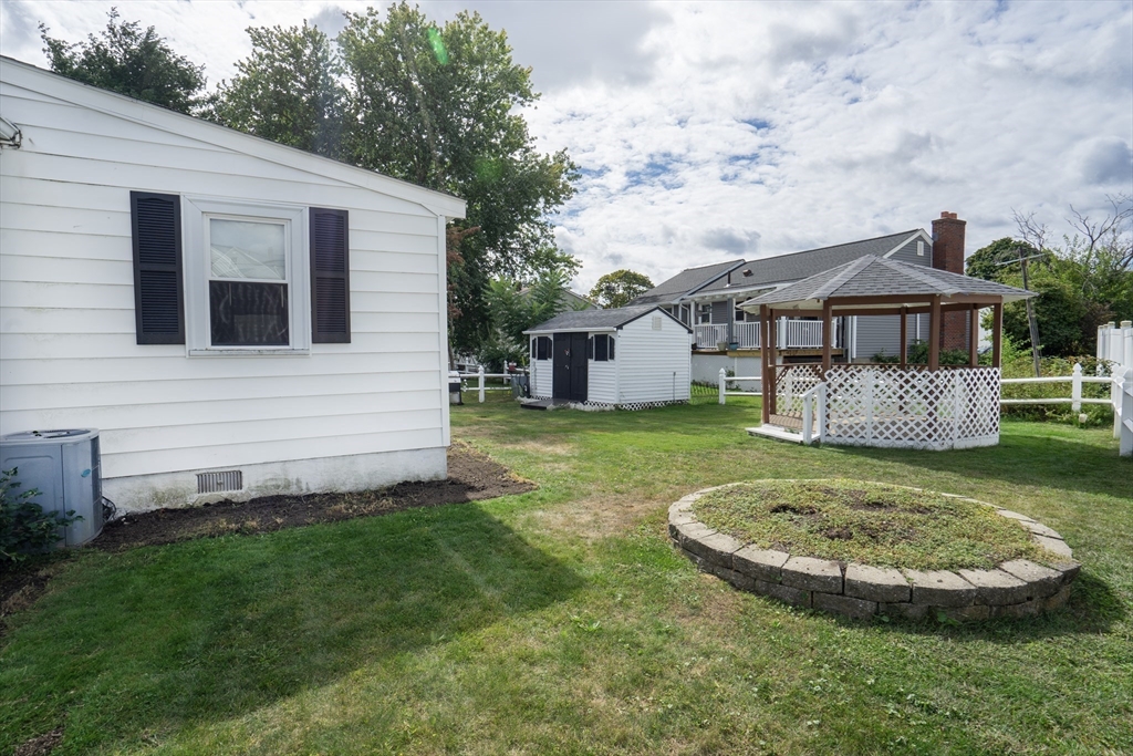 5 Hampton Street Saugus, MA 01906 - Photo 5 of 24 a view of a house with a yard balcony and sitting area