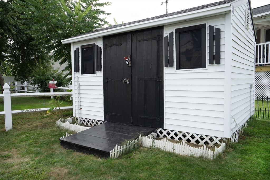 5 Hampton Street Saugus, MA 01906 - Photo 7 of 24 a view of a house with a yard