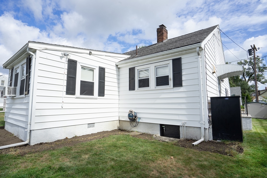 5 Hampton Street Saugus, MA 01906 - Photo 8 of 24 a view of a house with a yard