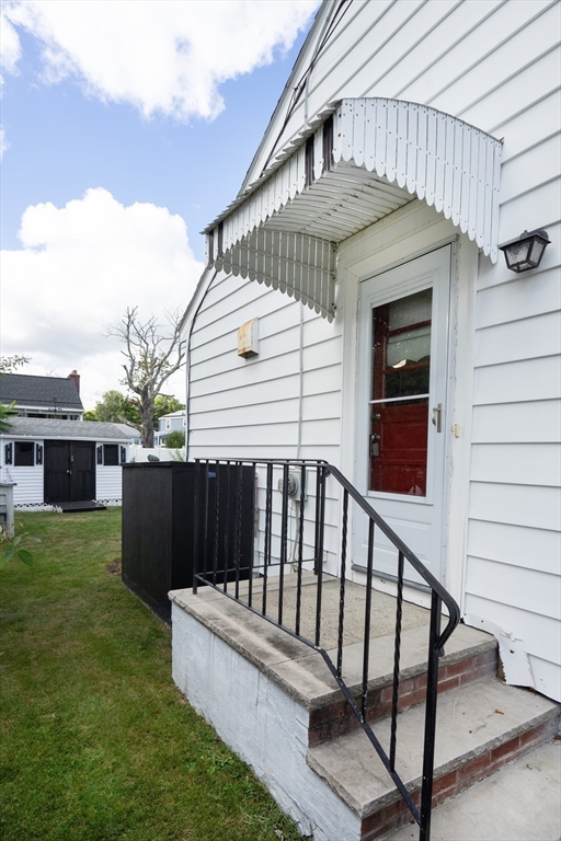 5 Hampton Street Saugus, MA 01906 - Photo 9 of 24 a view of a patio with a table and chairs