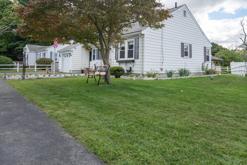 5 Hampton Street Saugus, MA 01906 - Photo 10 of 24 a front view of house with yard and green space