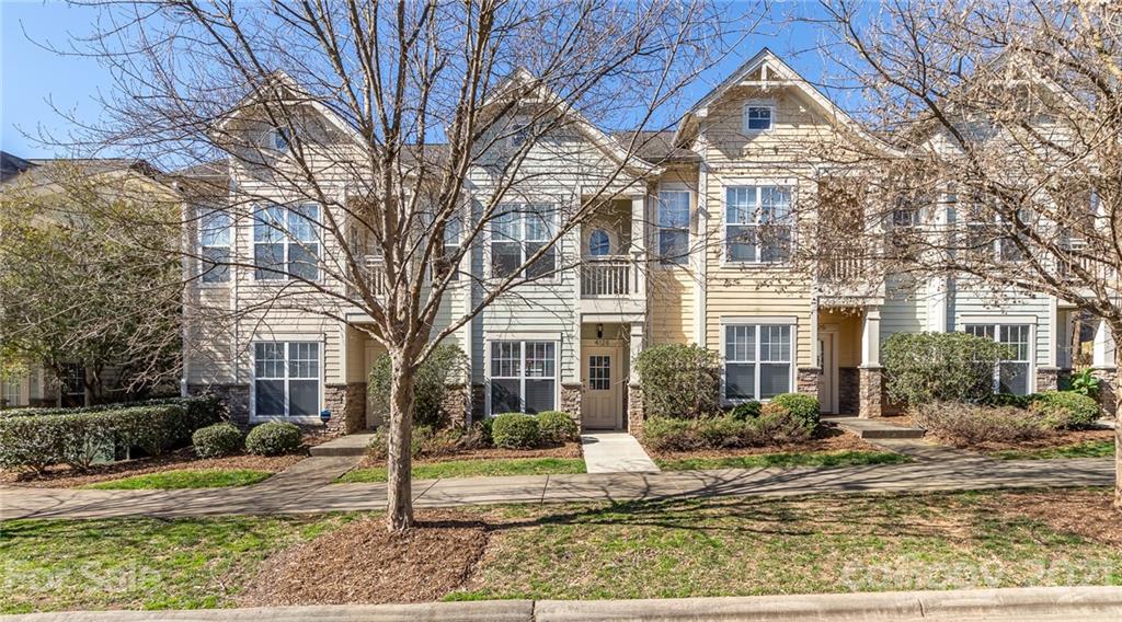 4128 Walker Road Charlotte, NC 28211 - Photo 1 of 31 a front view of a house with a yard