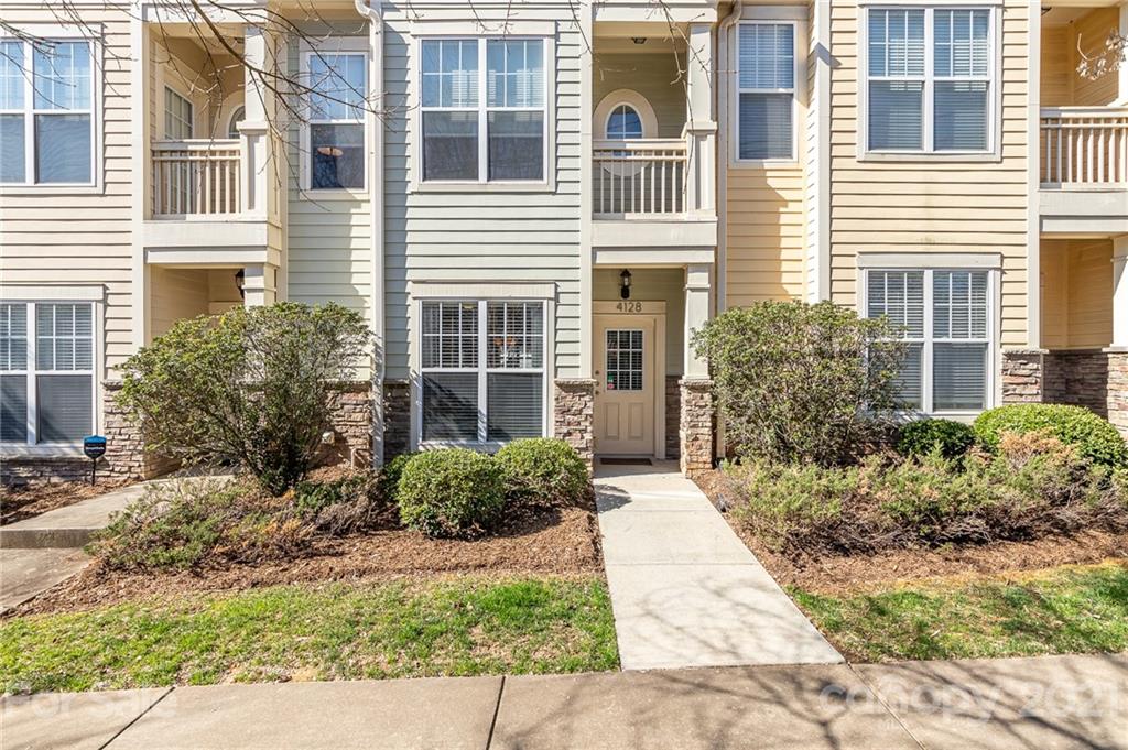 4128 Walker Road Charlotte, NC 28211 - Photo 2 of 31 a view of a building with potted plants