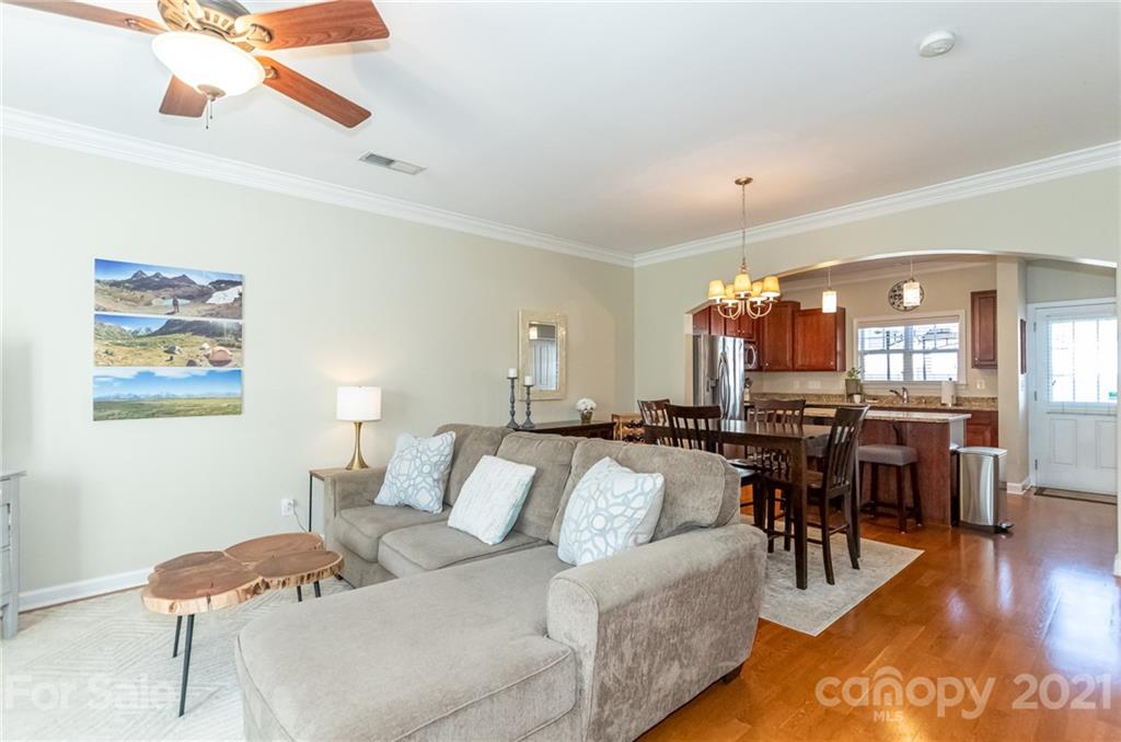 4128 Walker Road Charlotte, NC 28211 - Photo 6 of 31 a living room with furniture and wooden floor