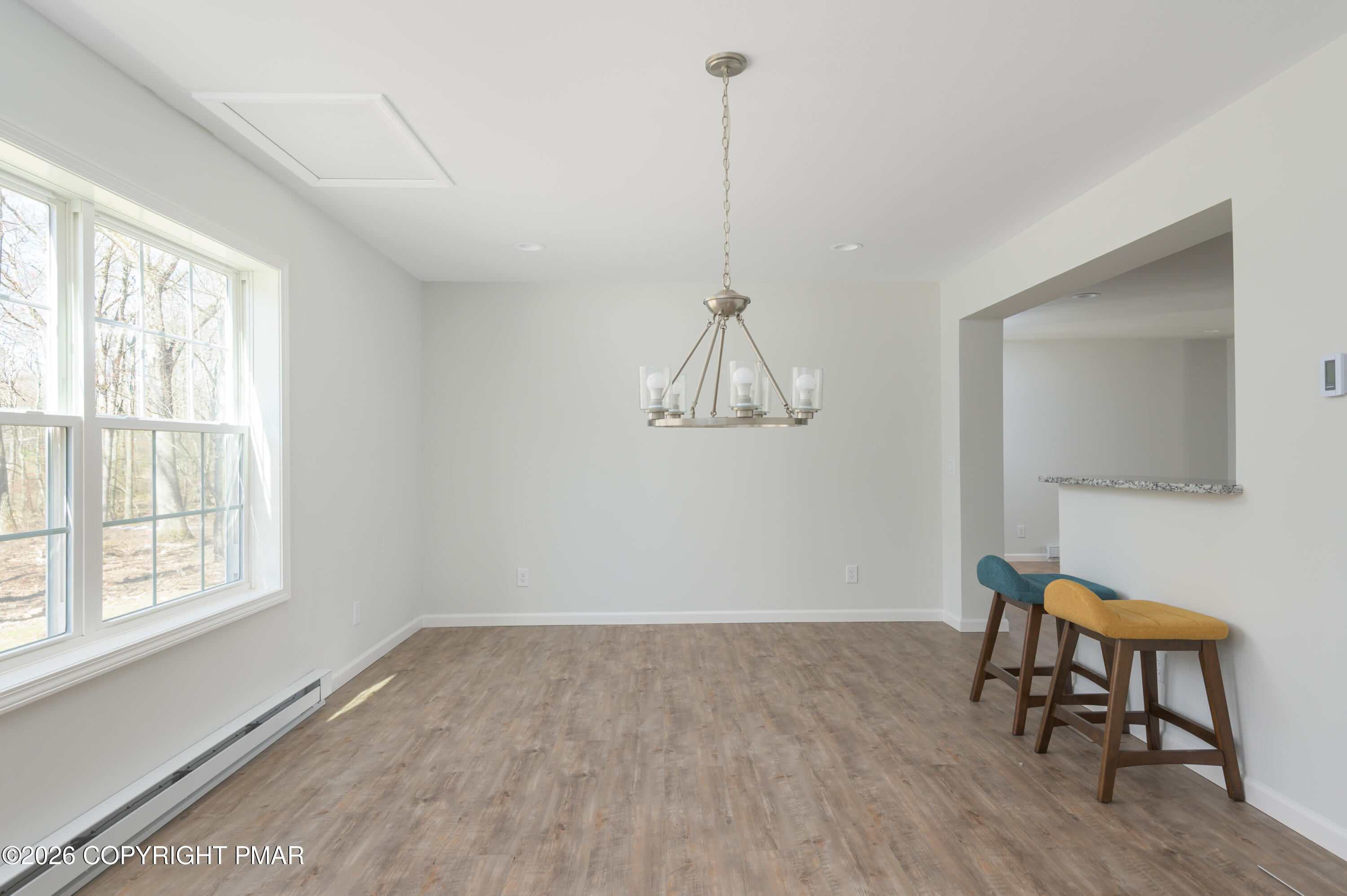 456 Big Oak Road Canadensis, PA 18325 - Photo 14 of 20 a view of a room with a window and wooden floor