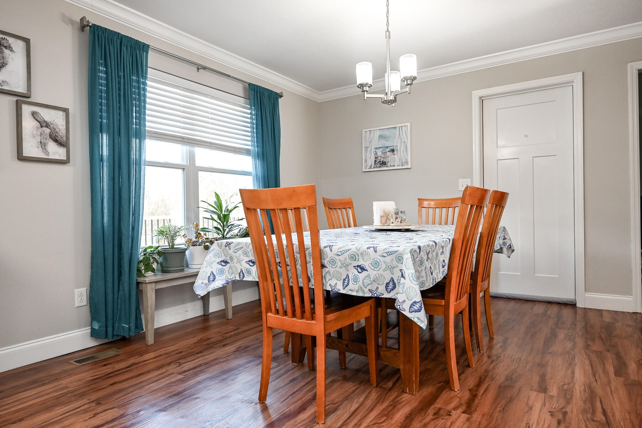 276 Mason Road McDonald, TN 37353 - Photo 16 of 67 a view of a dining room with furniture window and wooden floor