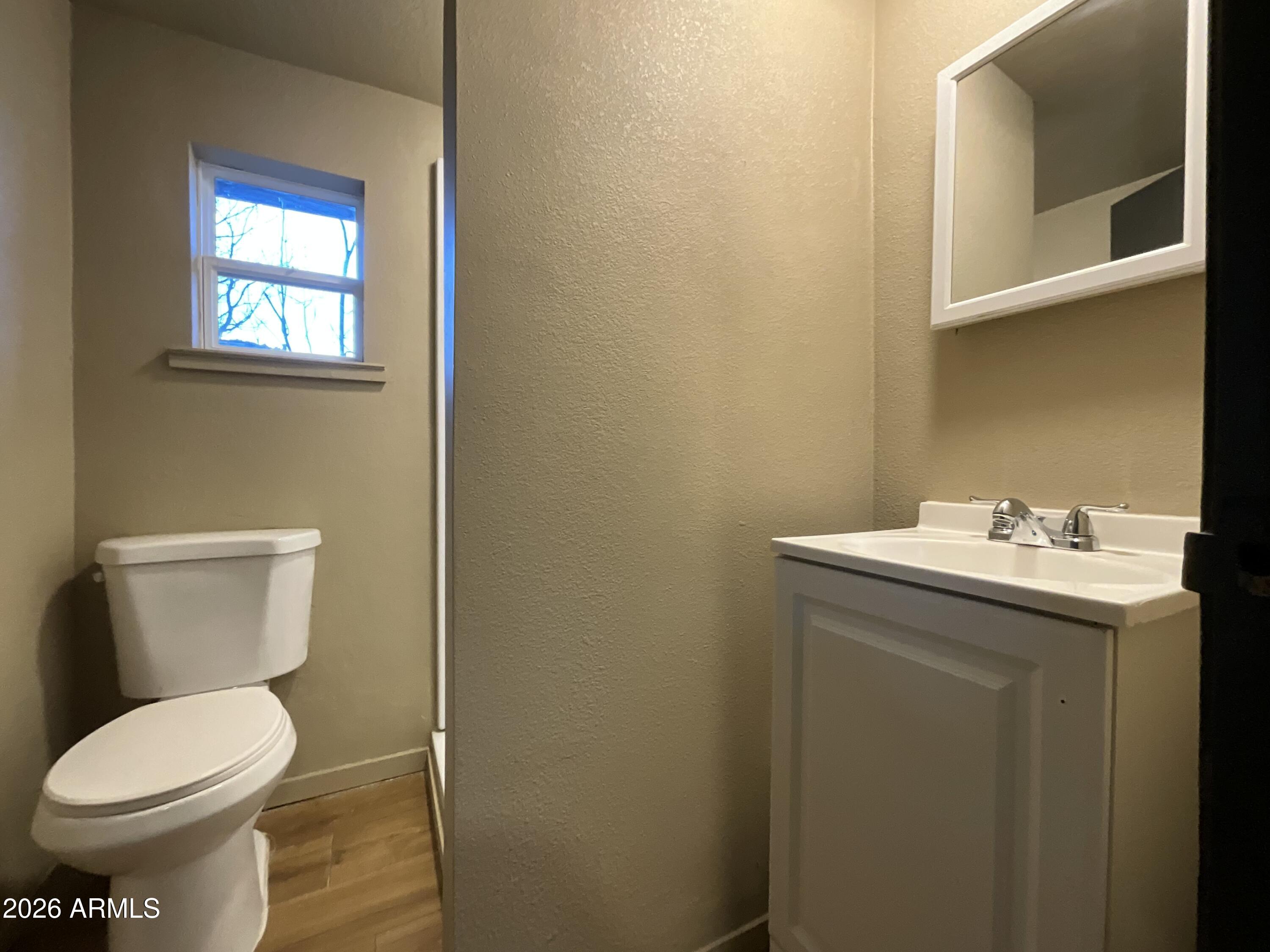 4382 East Copper Street Claypool, AZ 85532 - Photo 4 of 10 a bathroom with a sink and a toilet