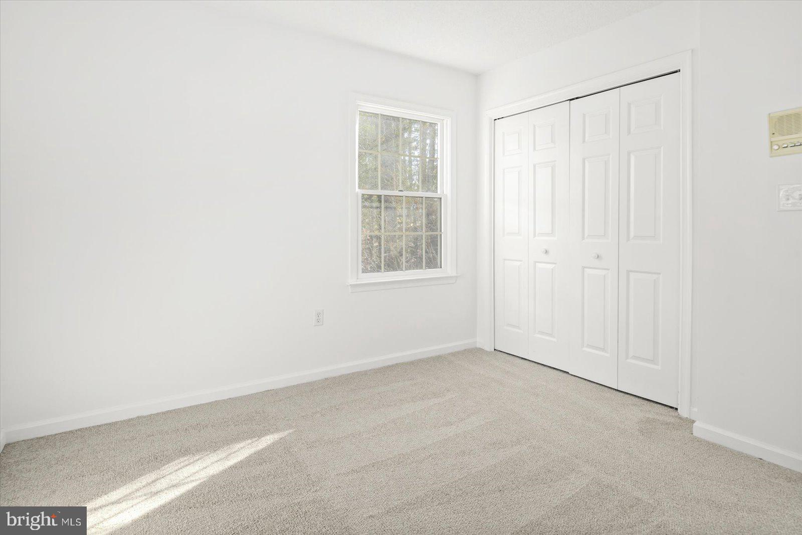 68 Falcon Bridge Road Berlin, MD 21811 - Photo 29 of 71 an empty room with windows