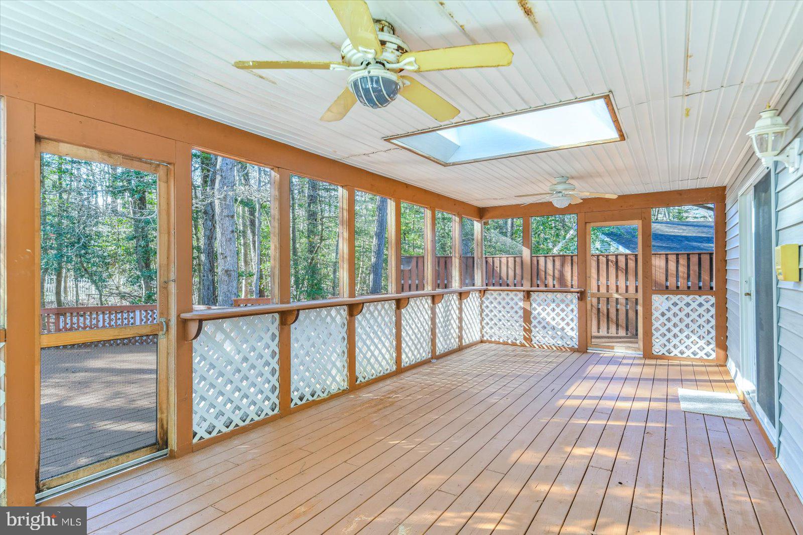 68 Falcon Bridge Road Berlin, MD 21811 - Photo 34 of 71 a view of balcony with wooden floor