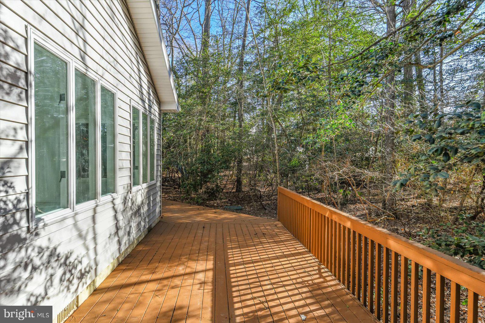 68 Falcon Bridge Road Berlin, MD 21811 - Photo 43 of 71 a view of a balcony with wooden floor