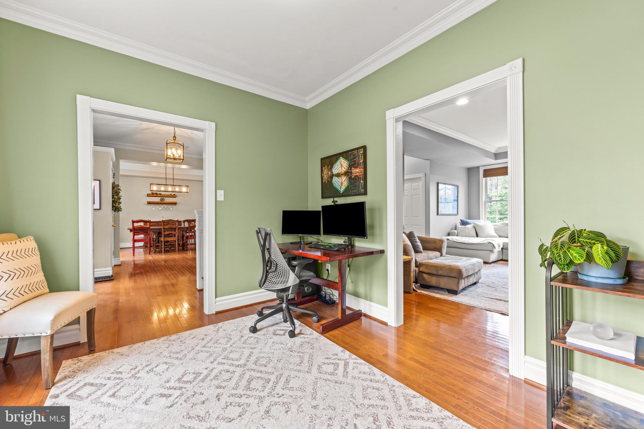 776 Snodgrass Road Crownsville, MD 21032 - Photo 11 of 82 a living room with furniture and a wooden floor