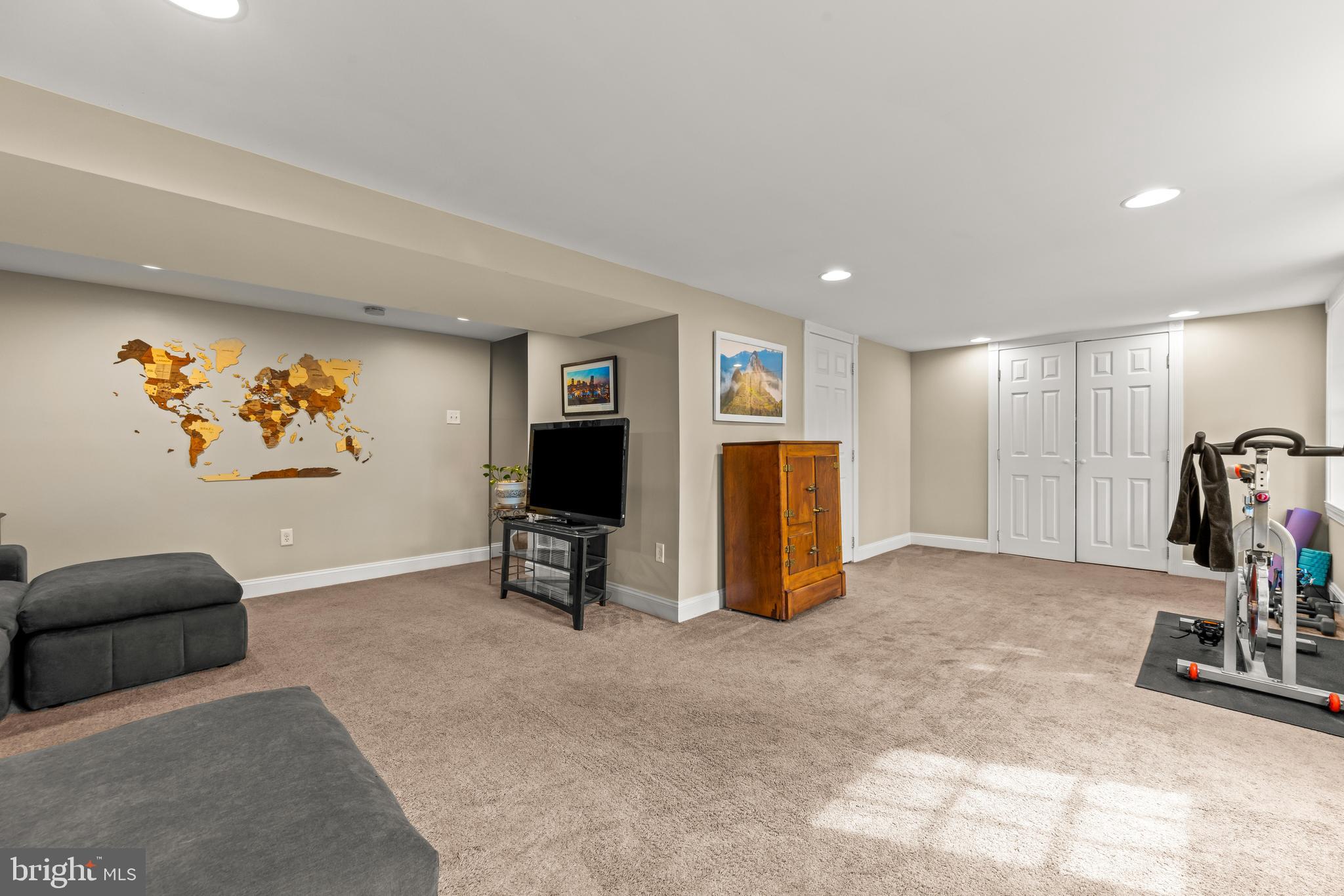 776 Snodgrass Road Crownsville, MD 21032 - Photo 34 of 82 a view of a livingroom with workspace and a couch