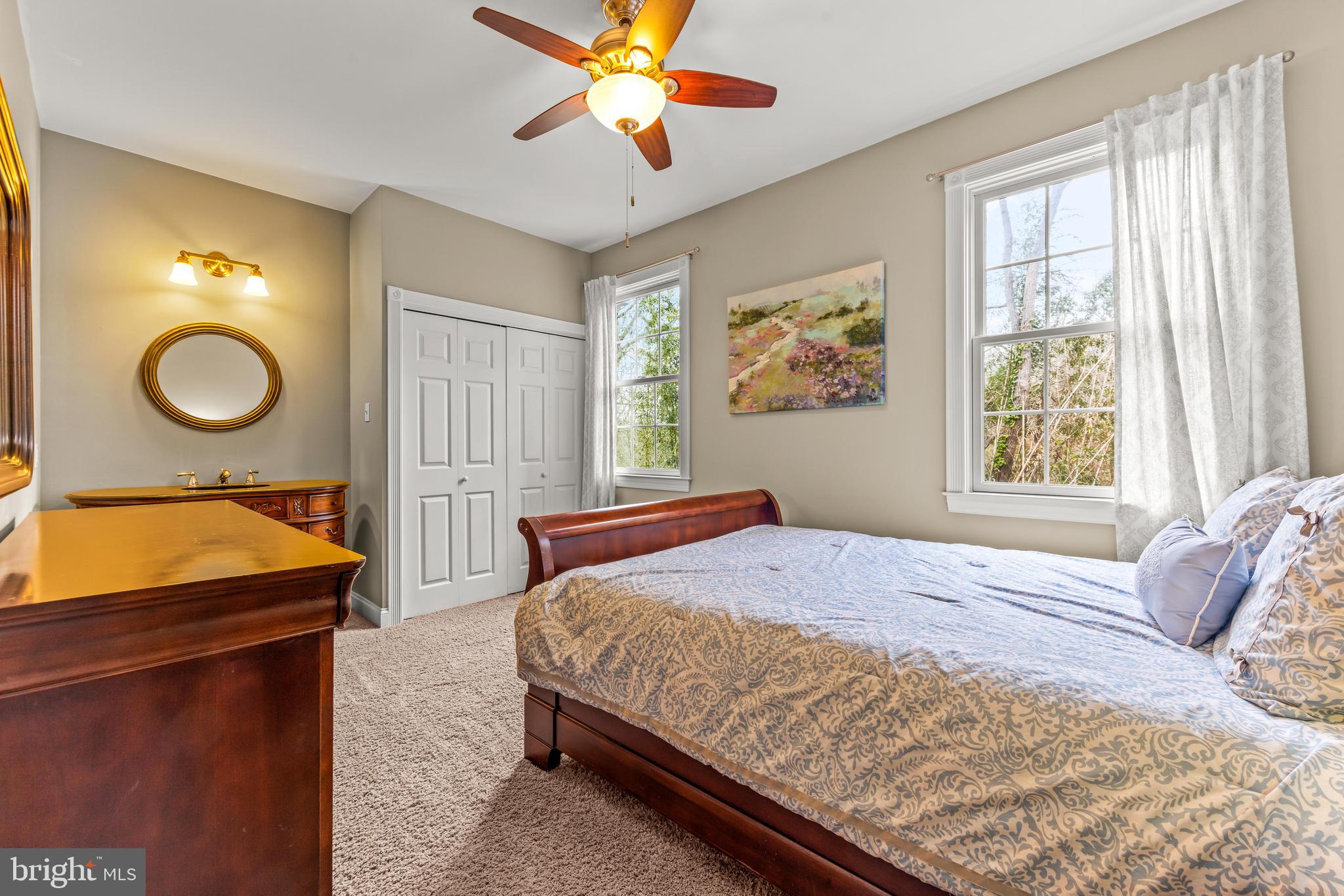 776 Snodgrass Road Crownsville, MD 21032 - Photo 45 of 82 a bedroom with a bed and window
