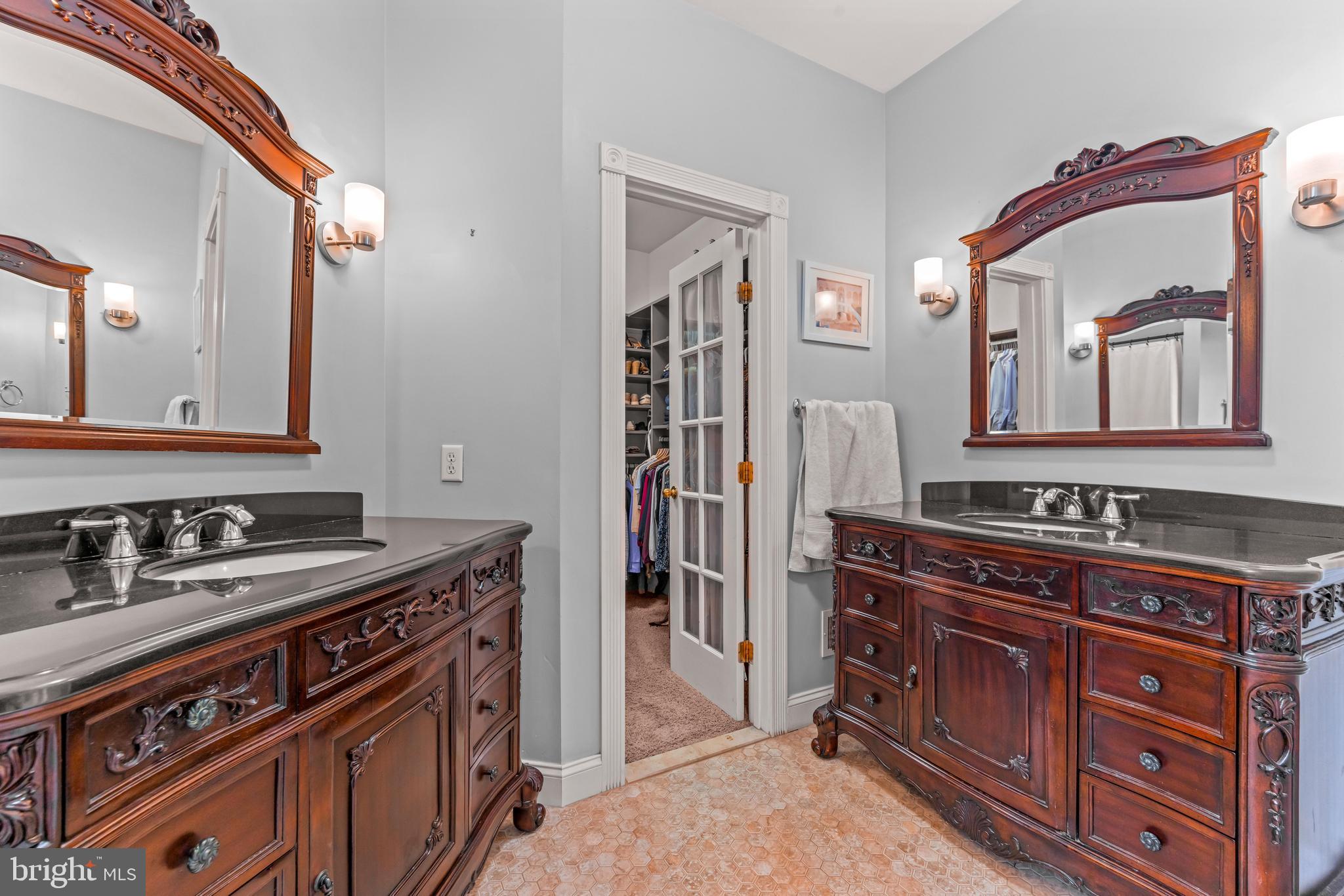 776 Snodgrass Road Crownsville, MD 21032 - Photo 51 of 82 a bathroom with a sink and a mirror