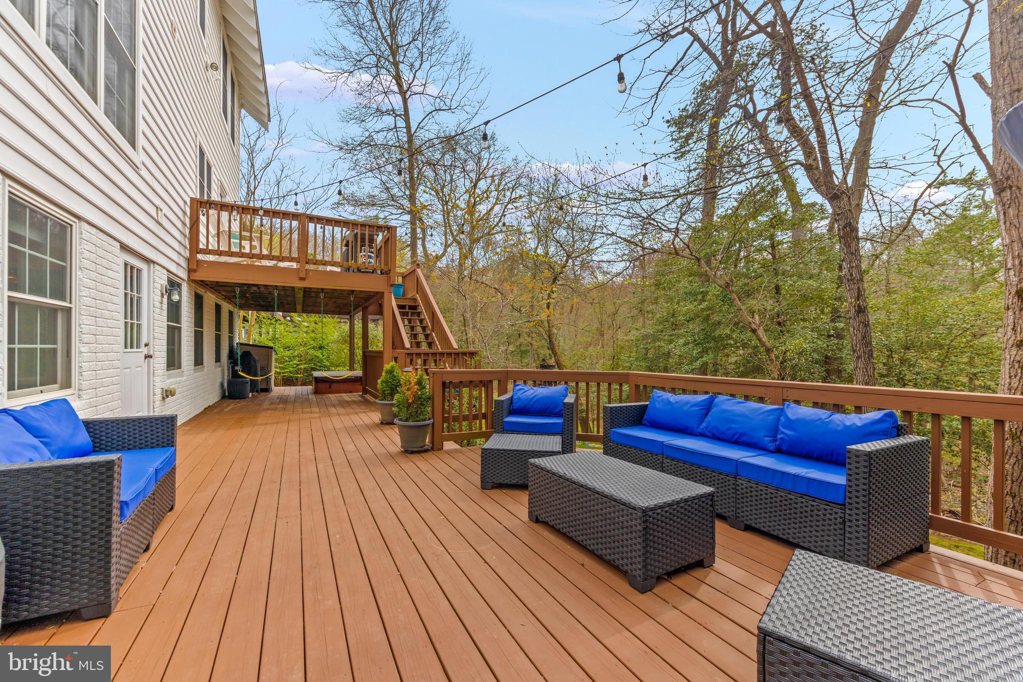 776 Snodgrass Road Crownsville, MD 21032 - Photo 61 of 82 a view of a rooftop deck with couch and chairs