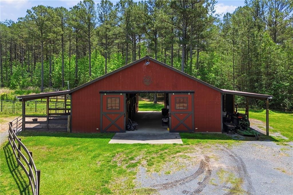 456 East Valley Road Northeast Rydal, GA 30171 - Photo 160 of 189 a backyard of a house with lots of green space