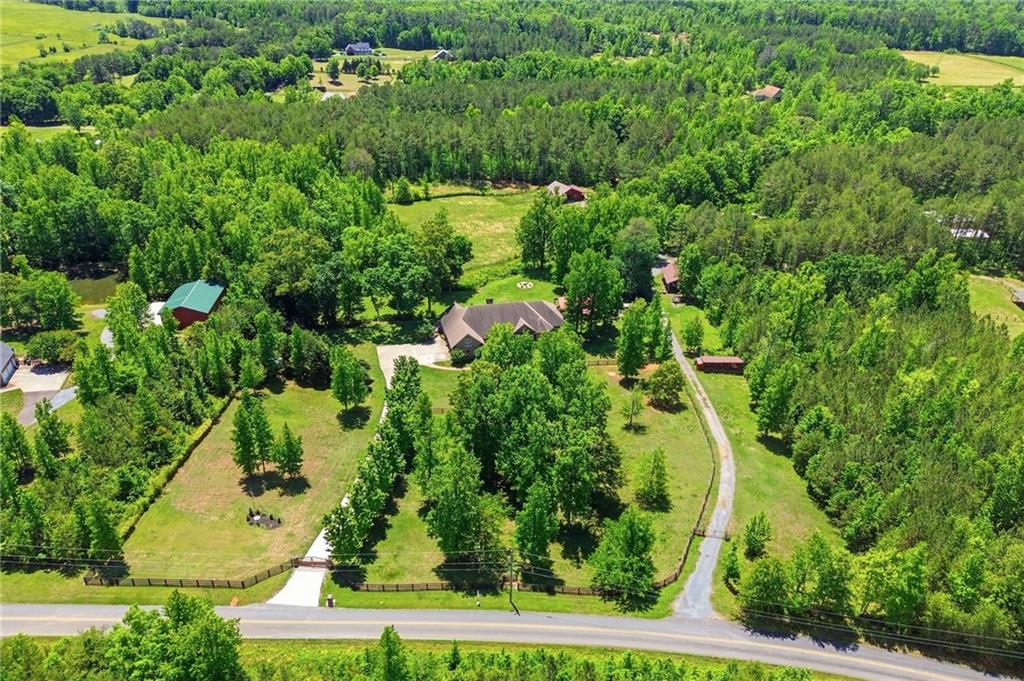 456 East Valley Road Northeast Rydal, GA 30171 - Photo 168 of 189 an aerial view of residential house with outdoor space and trees all around