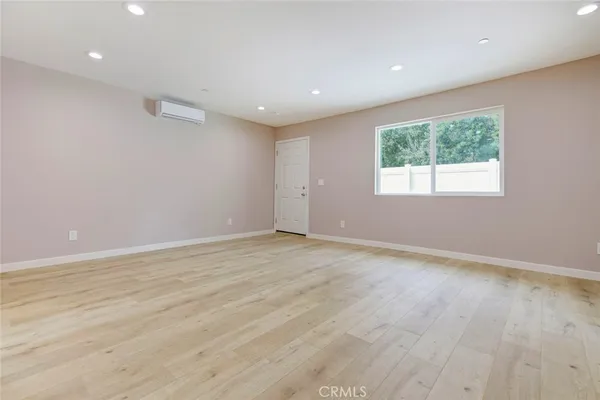 a kitchen with stainless steel appliances a stove and a refrigerator