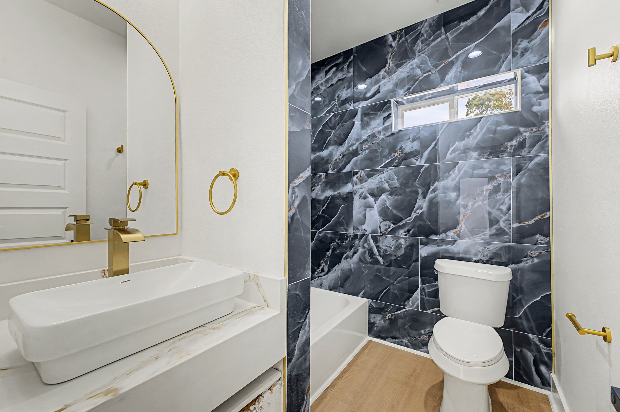 9214 Madera Road Houston, TX 77078 - Photo 15 of 24 a bathroom with a sink and a toilet