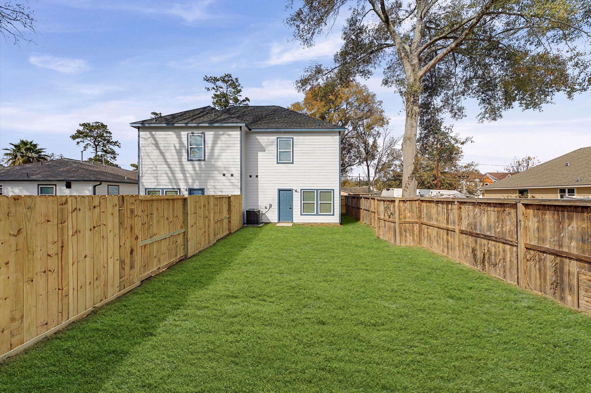 9214 Madera Road Houston, TX 77078 - Photo 19 of 24 a view of a backyard with wooden fence