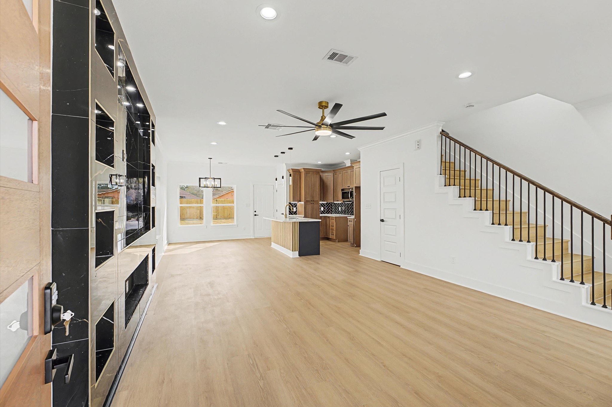 9214 Madera Road Houston, TX 77078 - Photo 4 of 24 a view of a living room with wooden floor