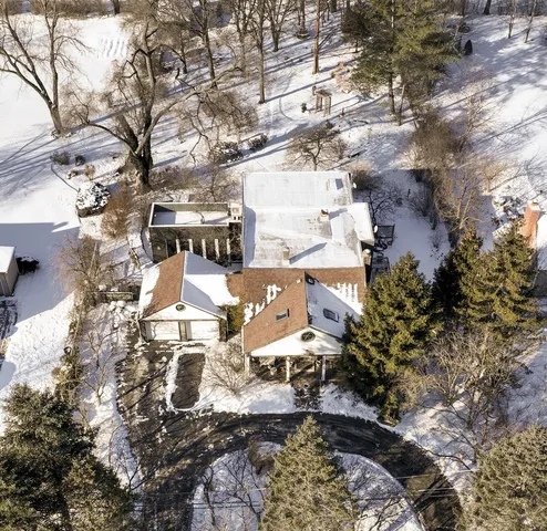 a kitchen with granite countertop a sink and cabinets
