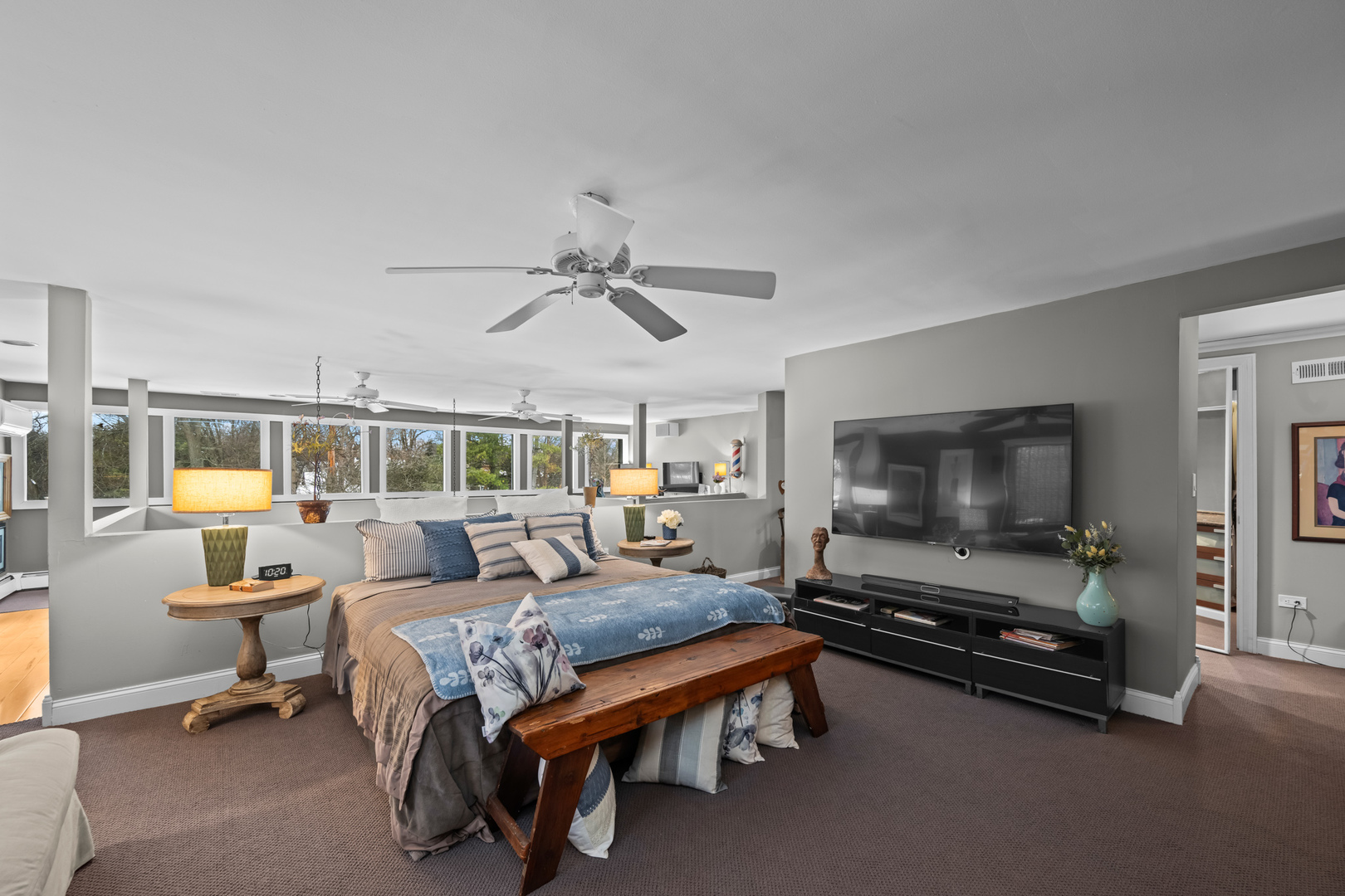 108 North Wheeling Road Prospect Heights, IL 60070 - Photo 23 of 54 a living room with furniture flat screen tv and windows