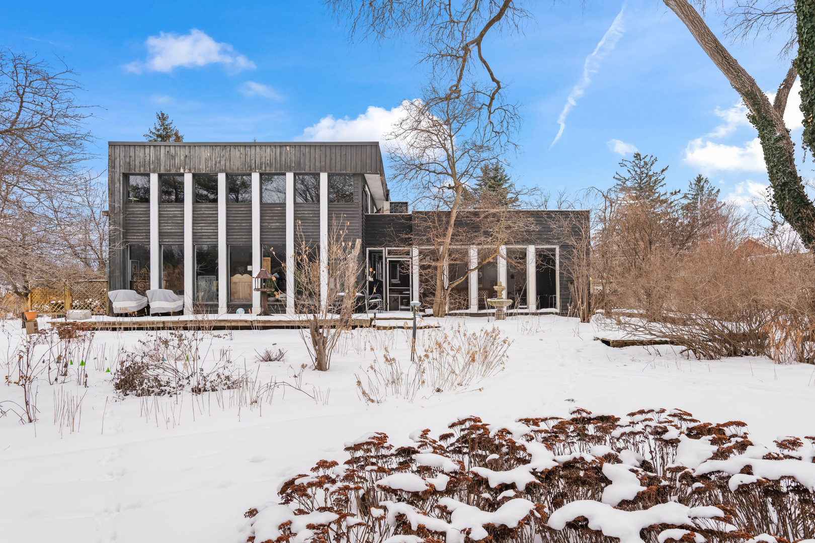 108 North Wheeling Road Prospect Heights, IL 60070 - Photo 38 of 54 a view of a house with snow on the side of road