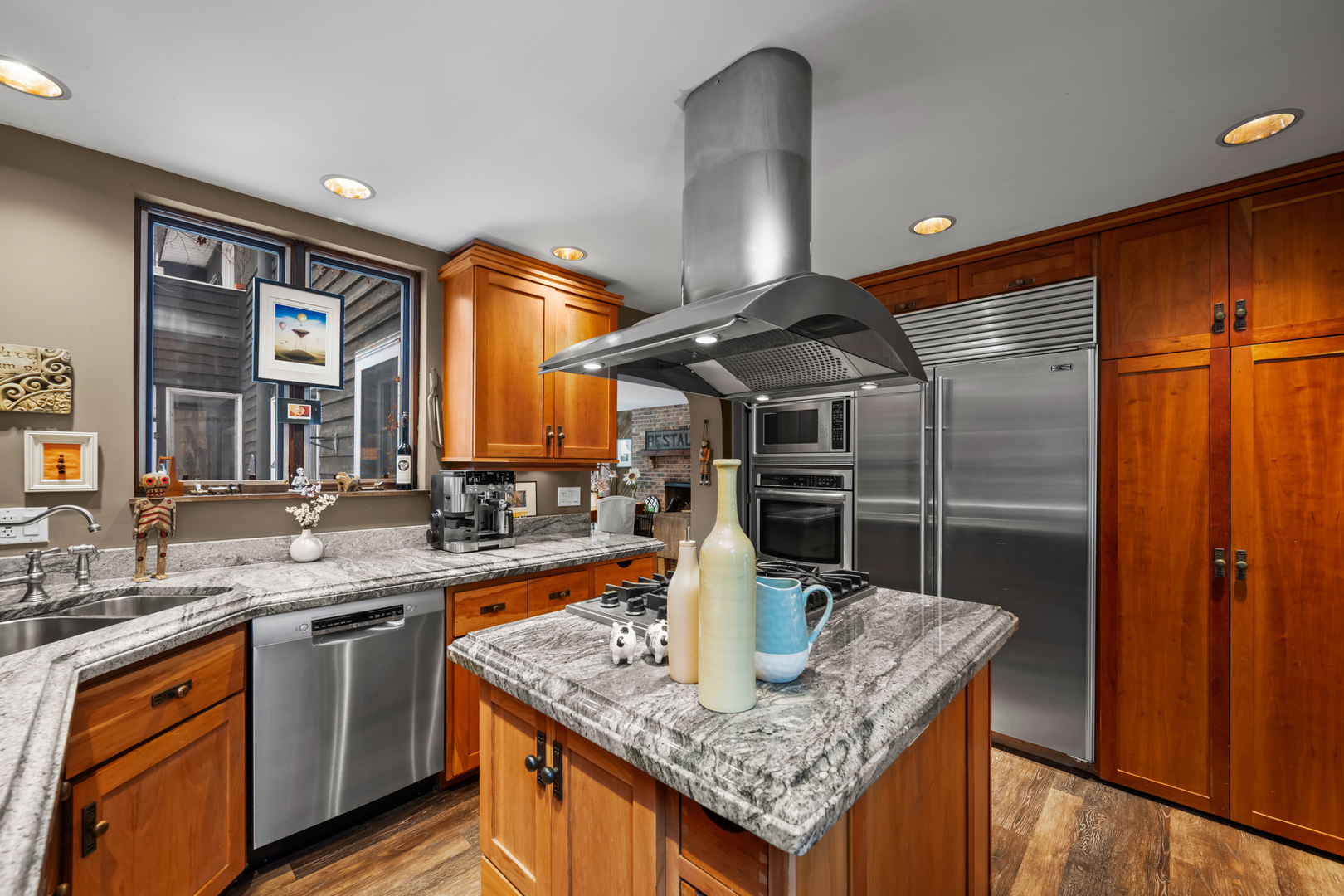 108 North Wheeling Road Prospect Heights, IL 60070 - Photo 4 of 54 a kitchen with granite countertop a sink and cabinets