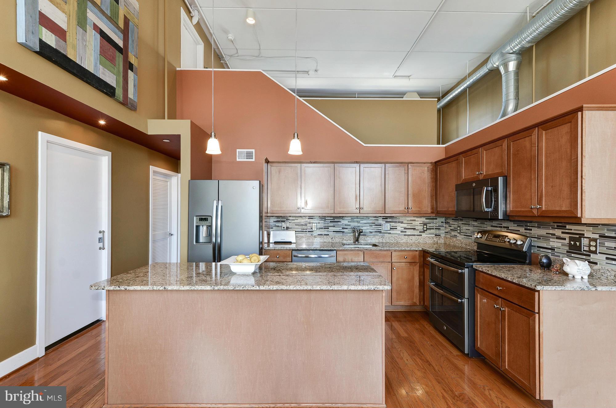 8326 Fenton Street, Unit A Silver Spring, MD 20910 - Photo 11 of 30 Kitchen island or breakfast bar