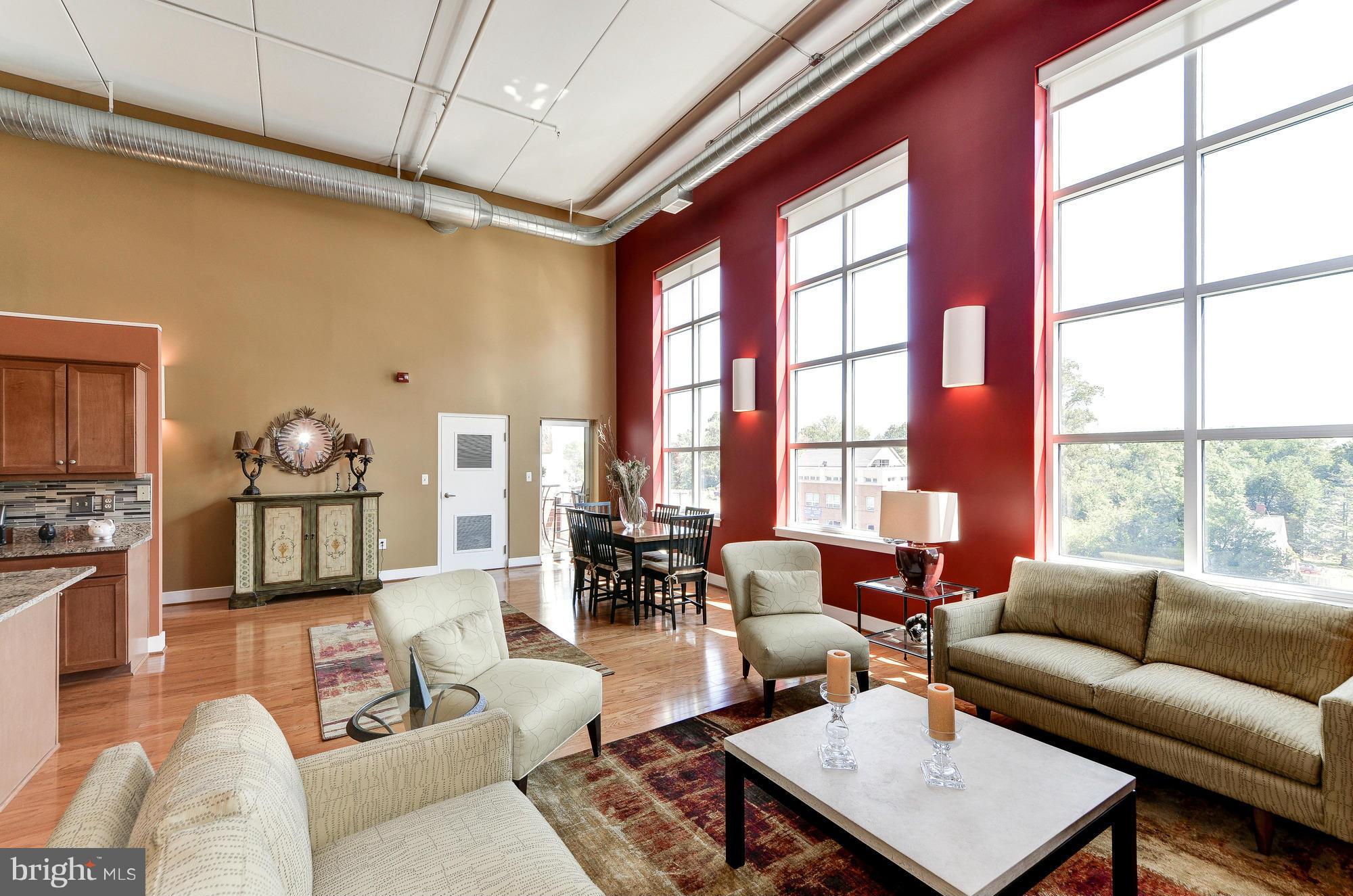 8326 Fenton Street, Unit A Silver Spring, MD 20910 - Photo 13 of 30 Light-filled space with 2-story ceilings