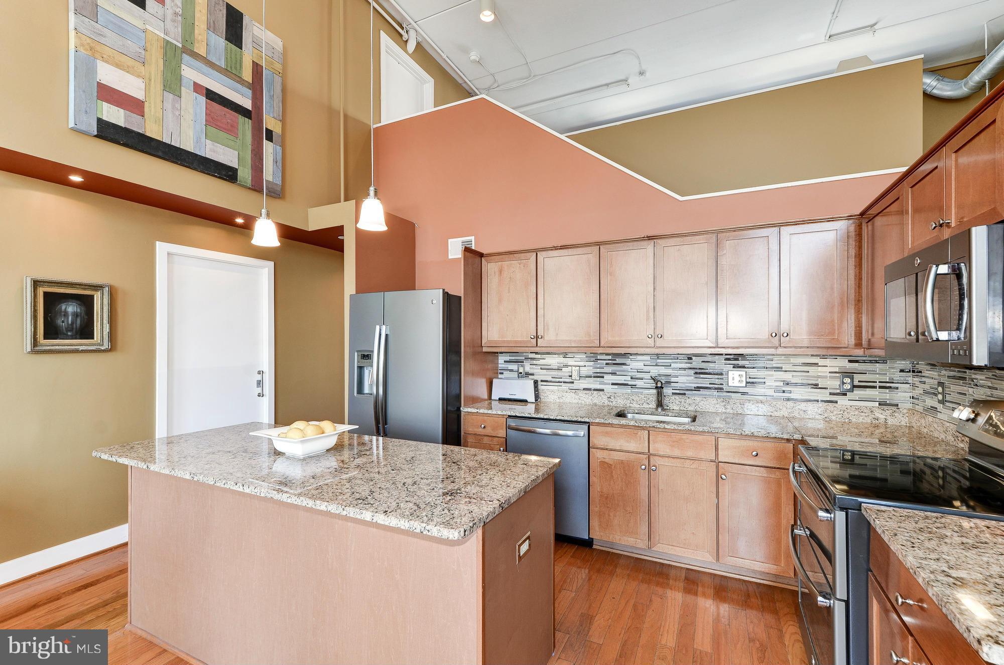 8326 Fenton Street, Unit A Silver Spring, MD 20910 - Photo 10 of 30 Custom glass tile backsplash