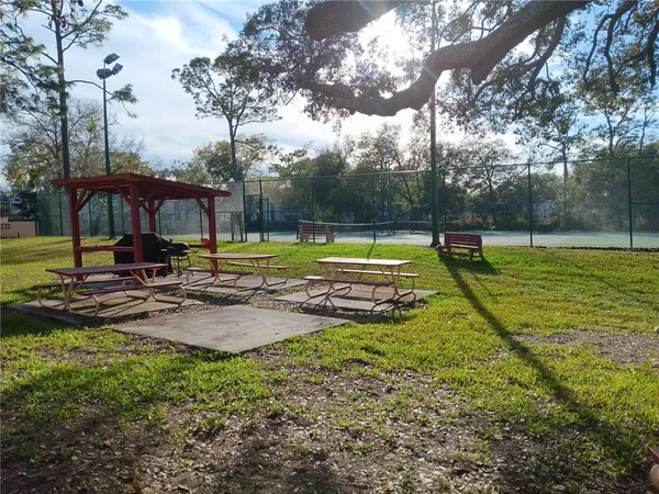 a view of a park with swings