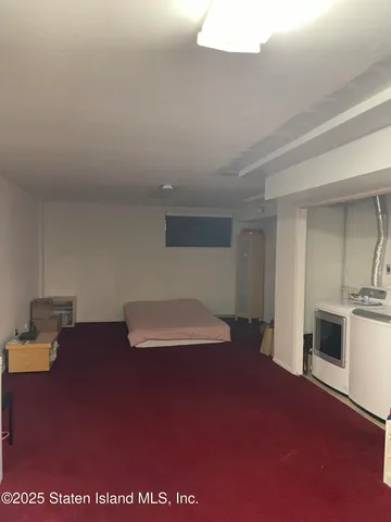 a view of a livingroom with a kitchen