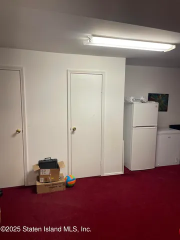 a view of a livingroom with furniture