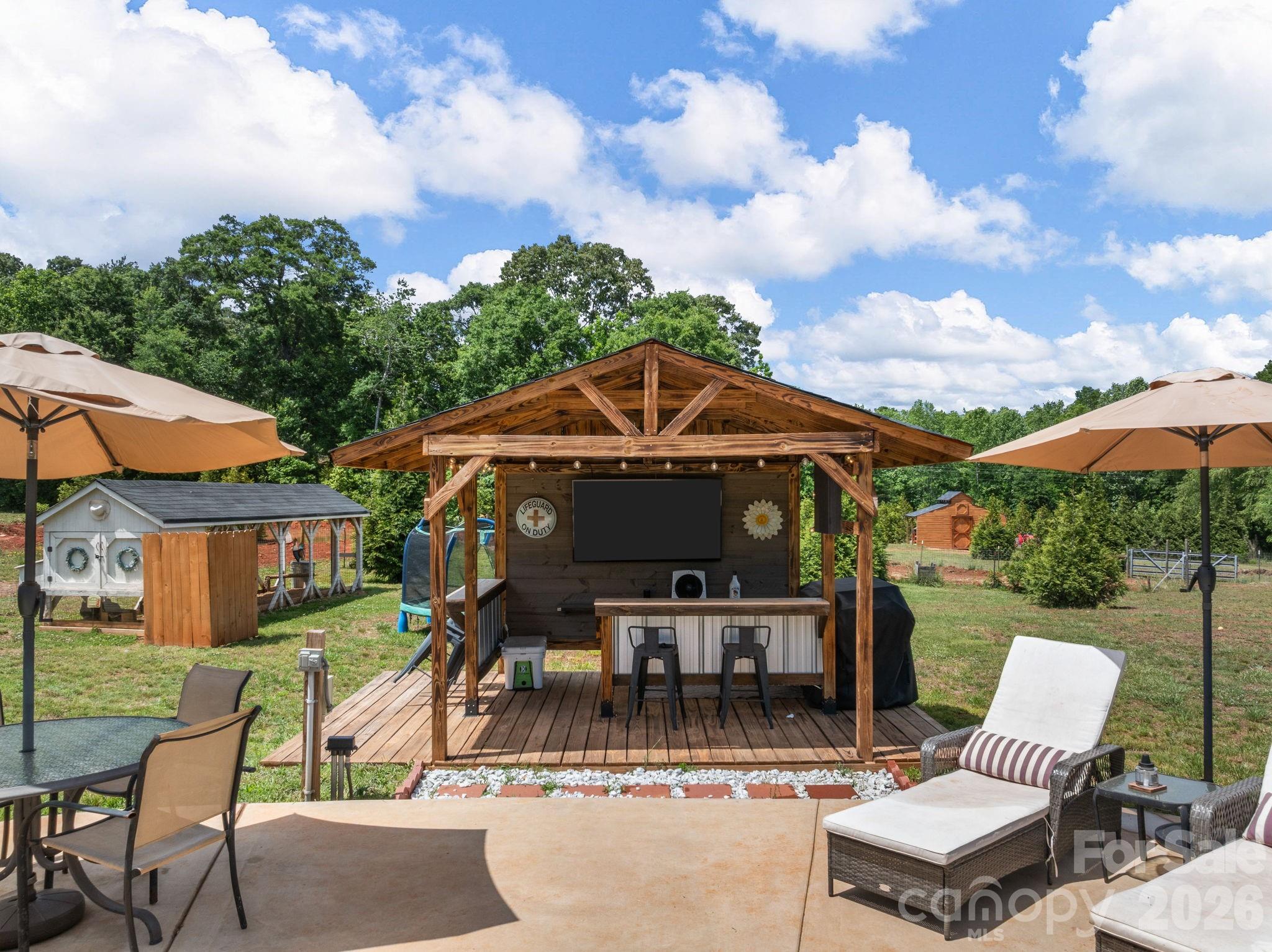 1076 McSwain Road Chesnee, SC 29323 - Photo 32 of 36 an outdoor space with patio