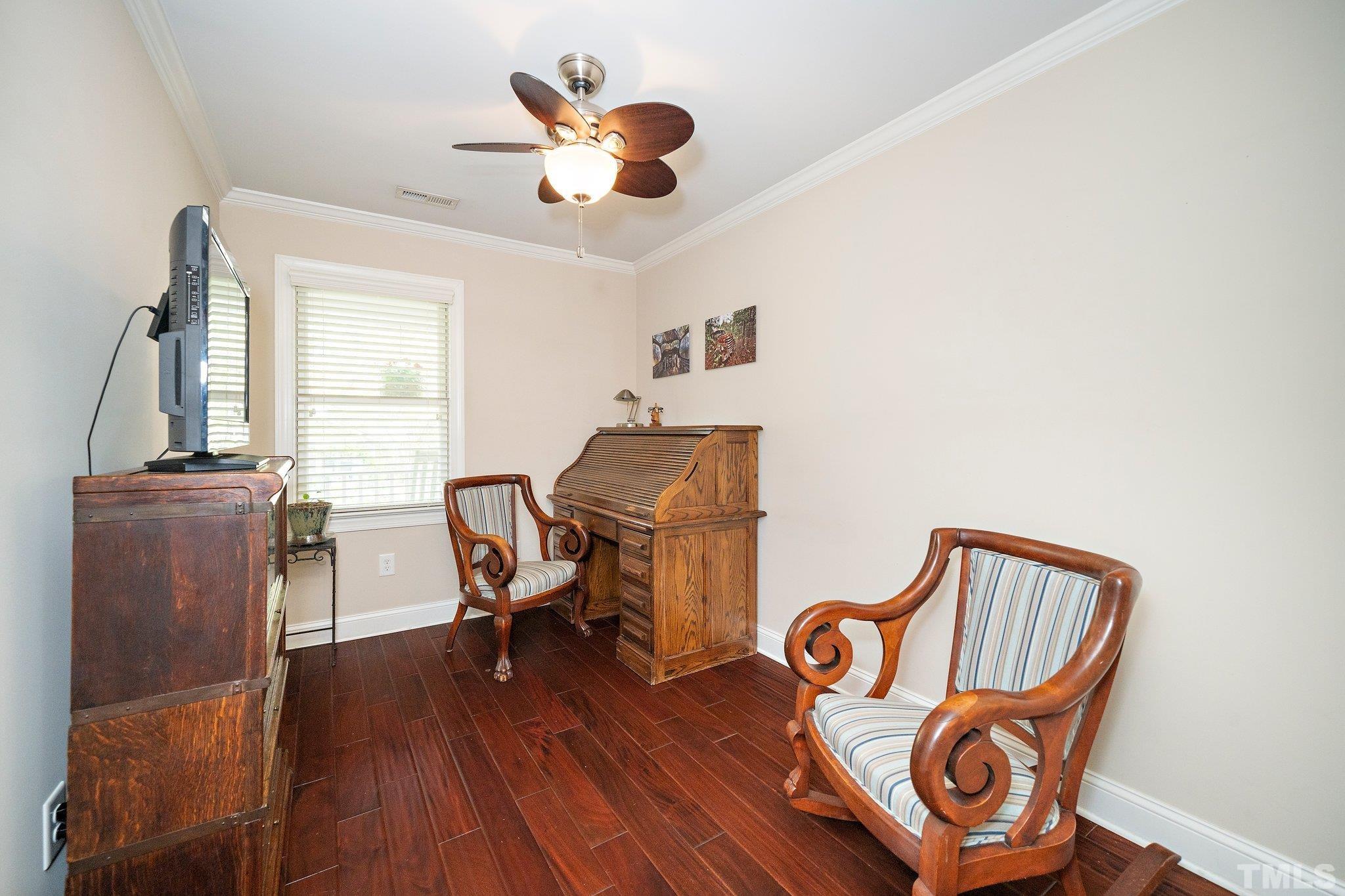 606 North Boundary Street Raleigh, NC 27604 - Photo 13 of 16 a view of a workspace with furniture and wooden floor