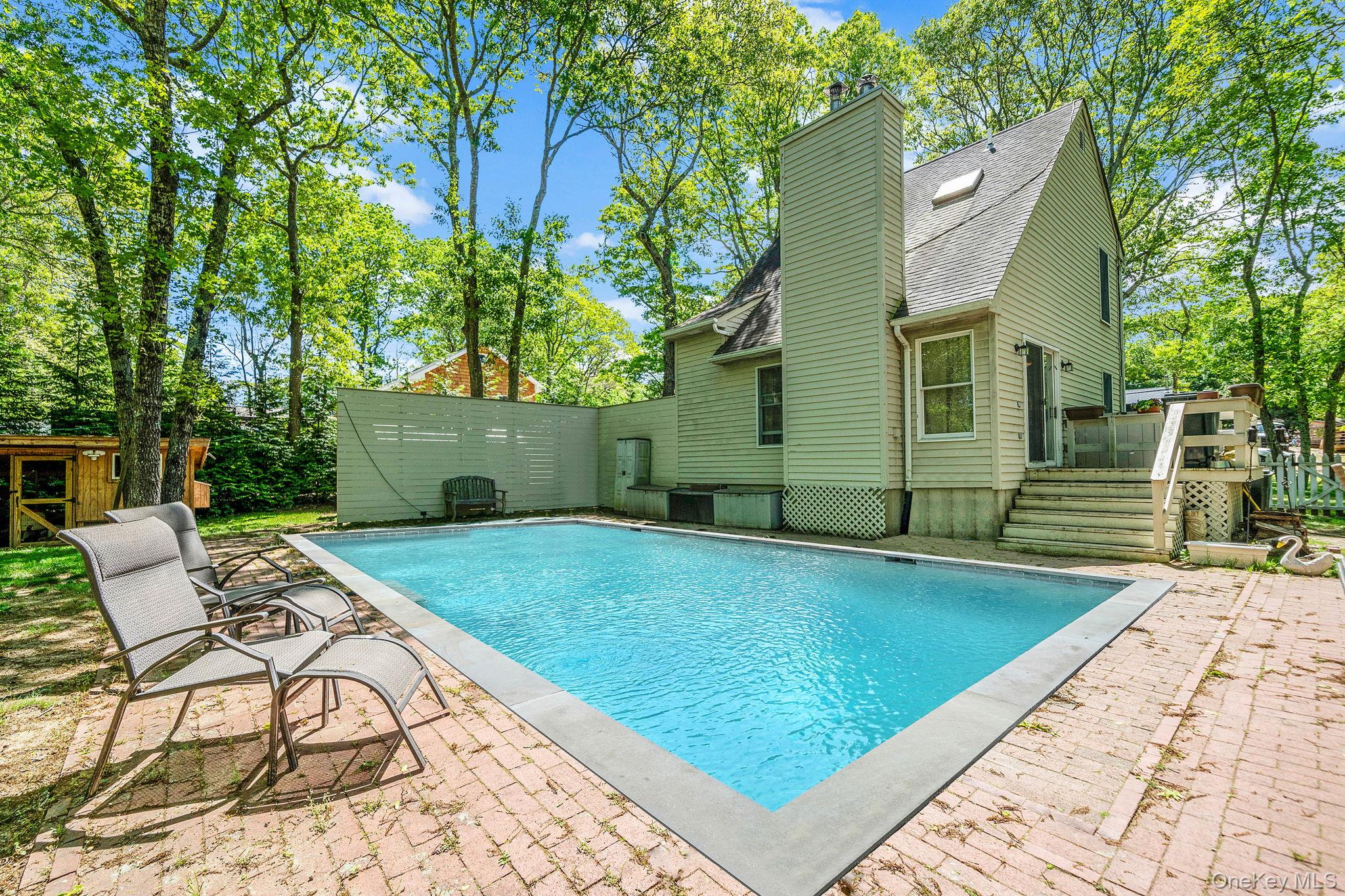 28 Huntting Road East Hampton, NY 11937 - Photo 10 of 14 View of swimming pool with a deck and a patio area