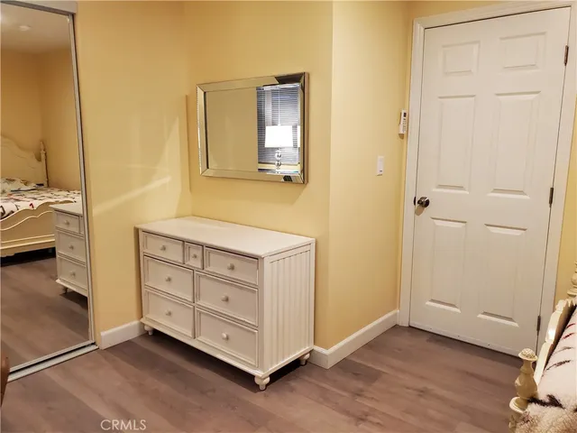 a workspace with furniture and a window