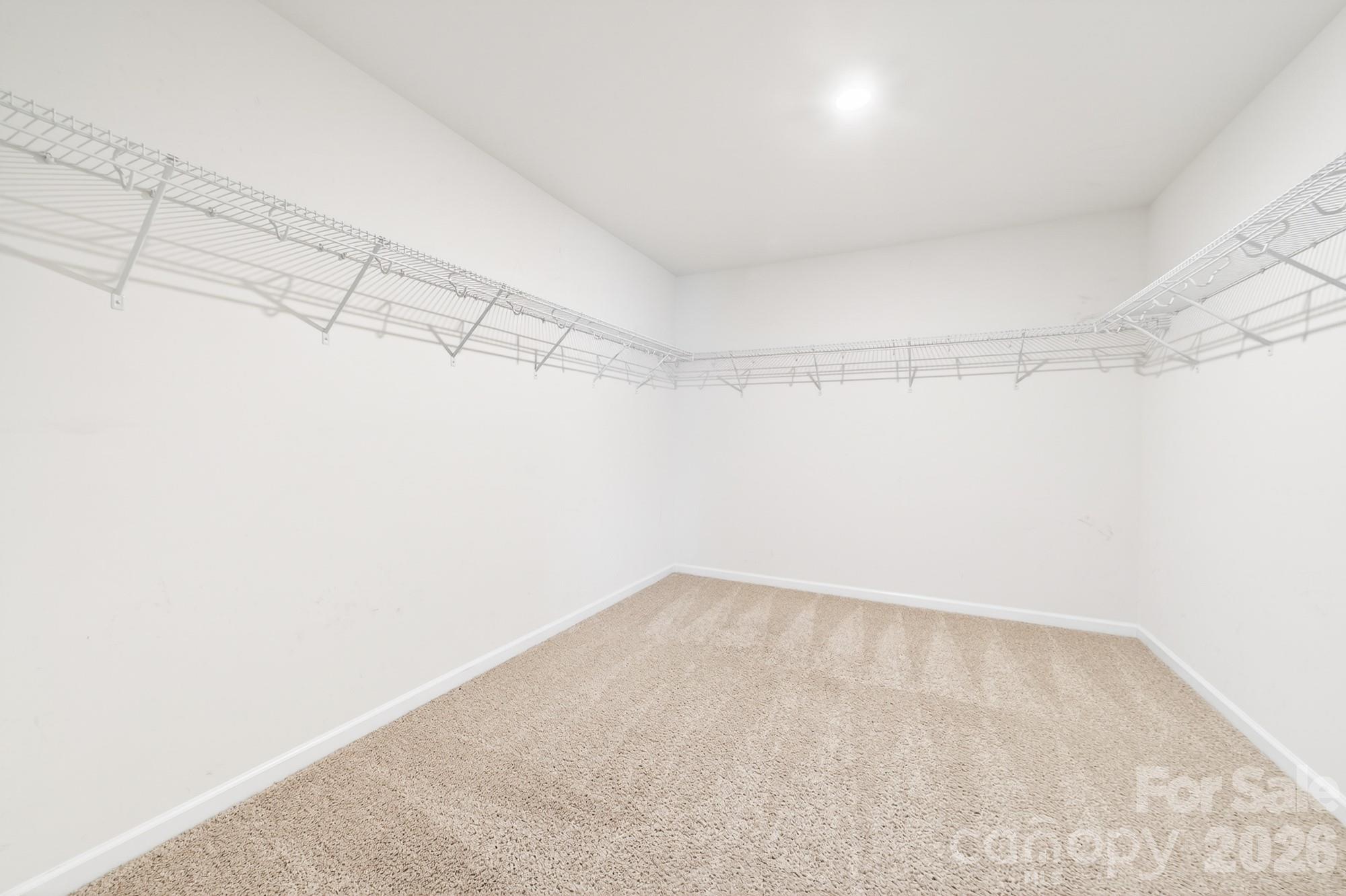 5972 Redwood Pine Road Concord, NC 28027 - Photo 27 of 37 a view of a room with racks on the wall