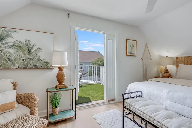 a view of a chair and table in the patio