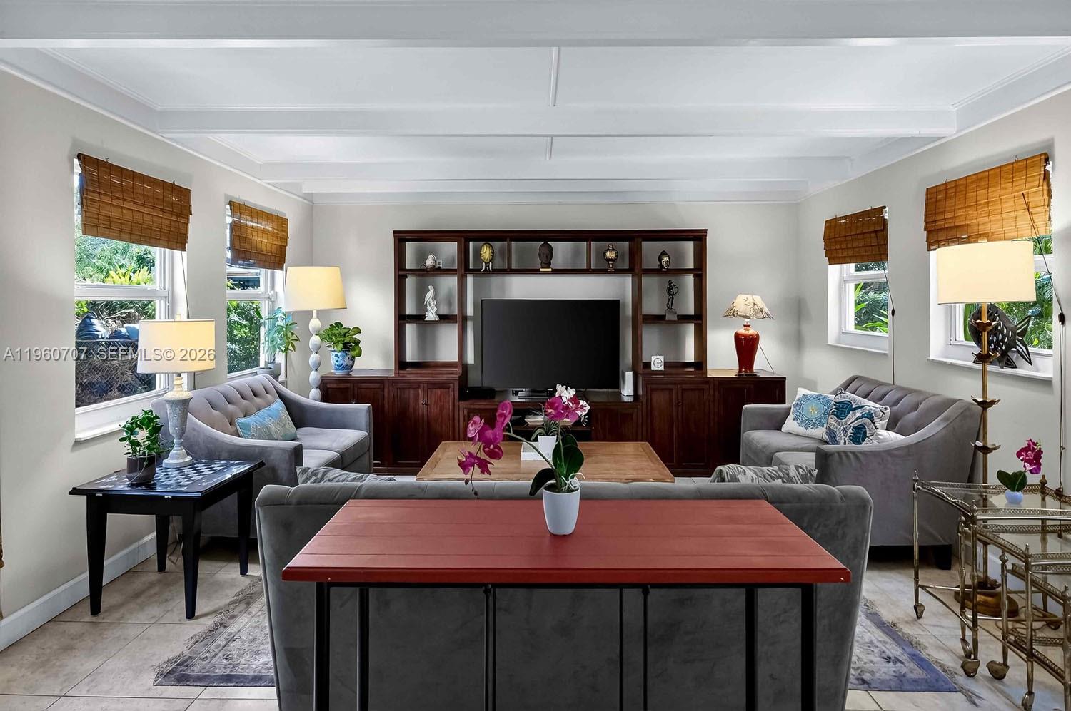 46 Northeast 100th Street Miami Shores, FL 33138 - Photo 22 of 28 a view of a dining room with furniture window and outside view