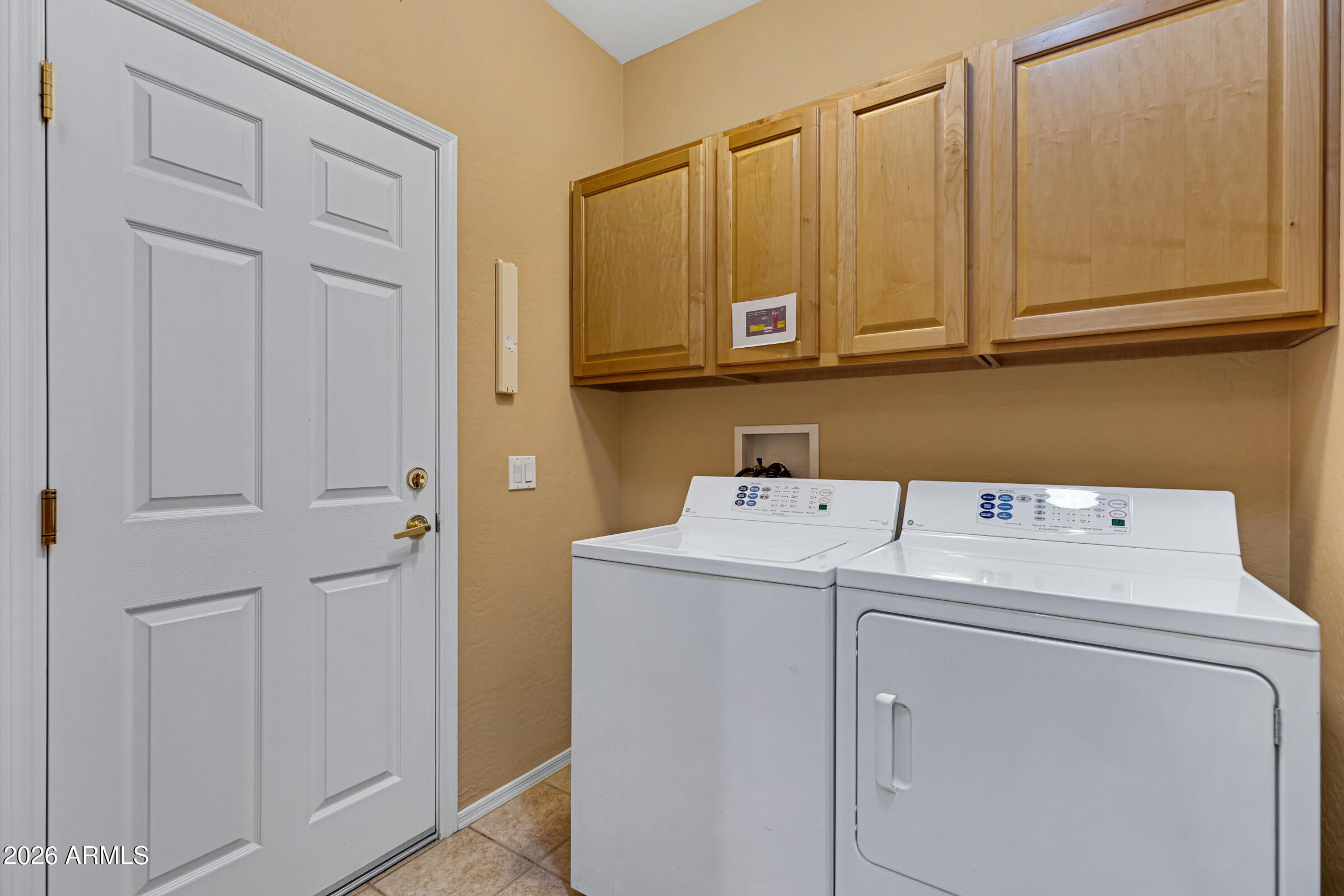 19253 North Hunters Run Surprise, AZ 85387 - Photo 23 of 30 a utility room with dryer and washer