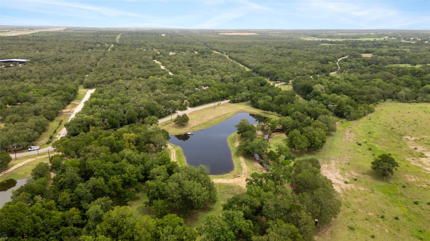 1000 Old Lytton Springs Road Lockhart, TX 78644 - Photo 16 of 22 an aerial view of residential houses with outdoor space and trees