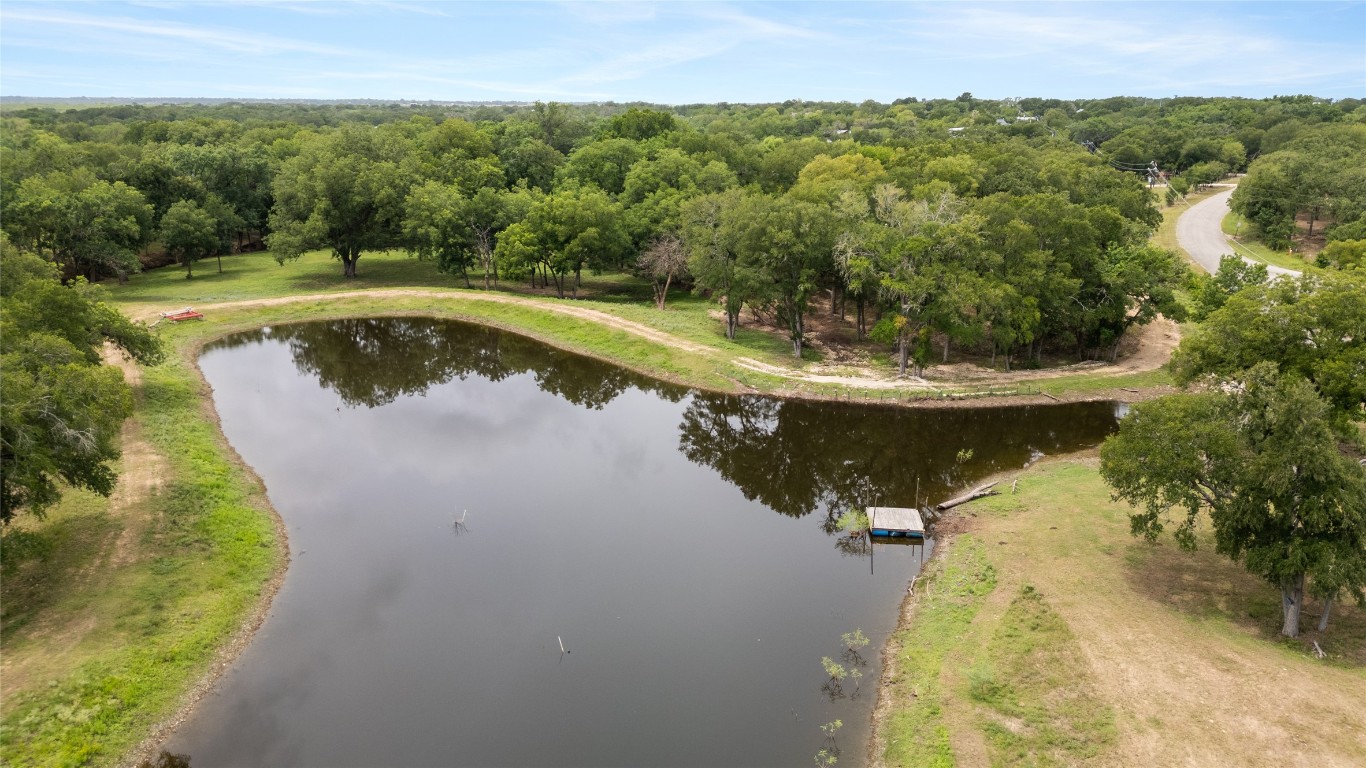 1000 Old Lytton Springs Road Lockhart, TX 78644 - Photo 2 of 22 a view of a swimming pool with a yard