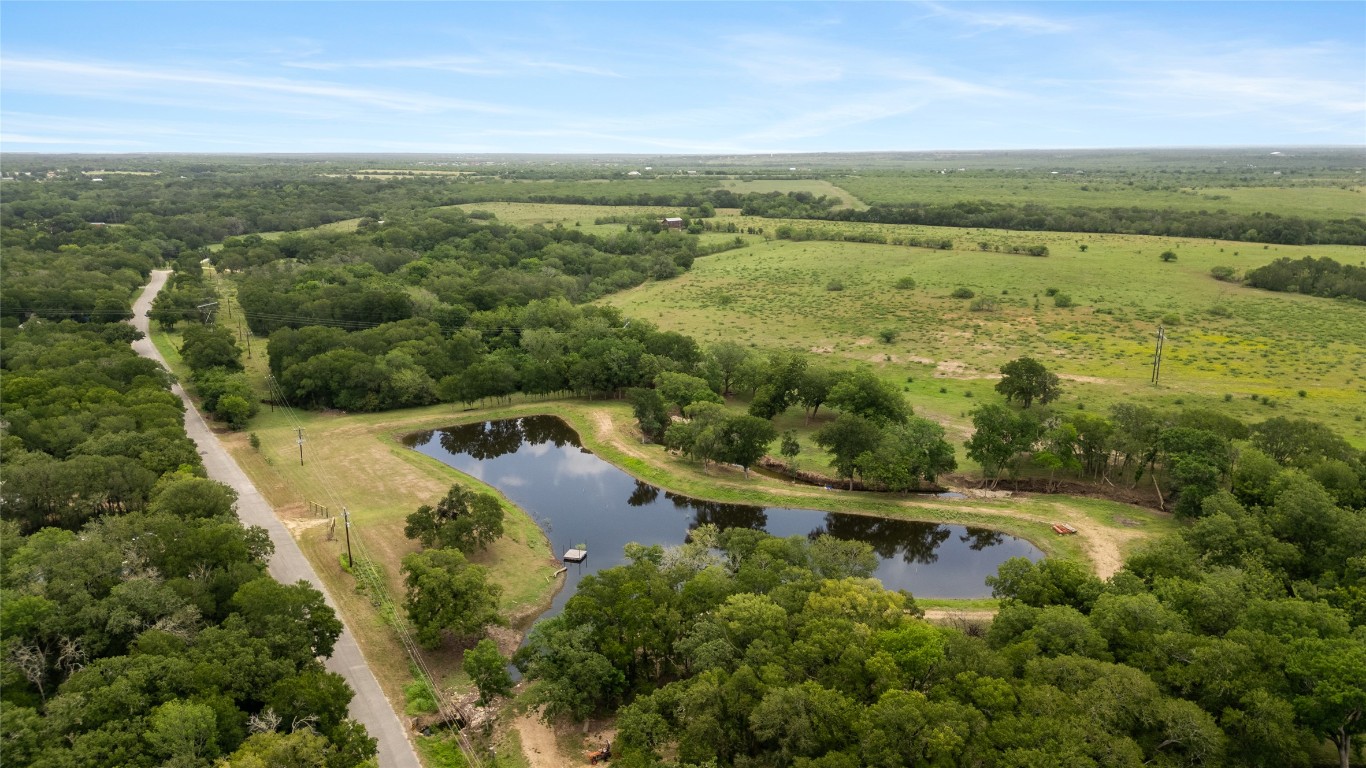 1000 Old Lytton Springs Road Lockhart, TX 78644 - Photo 21 of 22 an aerial view of residential houses with outdoor space and trees