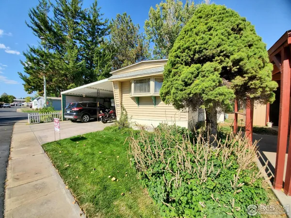 a view of a house with a garden
