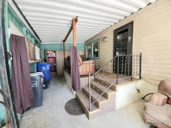 a view of living room with furniture and windows