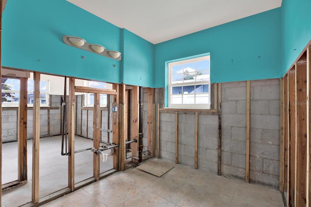 16218 1st Street East Redington Beach, FL 33708 - Photo 12 of 20 a view of a hallway with closet