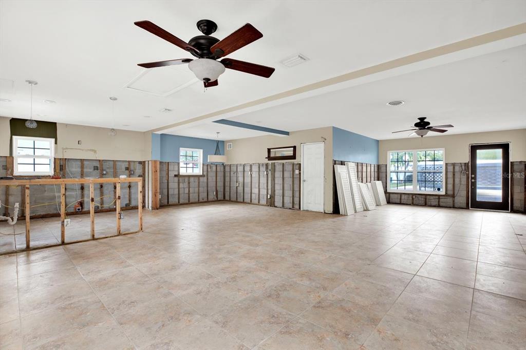 16218 1st Street East Redington Beach, FL 33708 - Photo 3 of 20 a view of livingroom with hardwood floor and ceiling fan